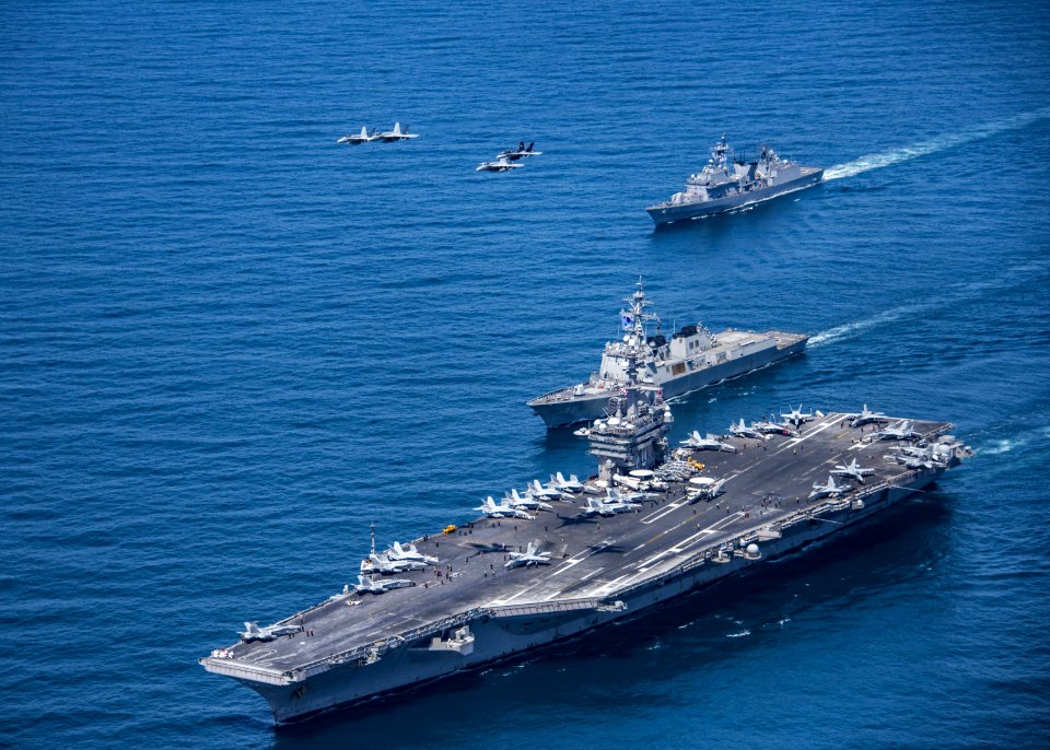 F-A-18 Hornets and Super Hornets fly over the Republic of Korea ships and USS Carl Vinson. (34449852825)