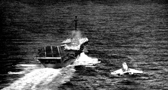 F3H-2 Demon of VF-193 lands on USS Bon Homme Richard (CVA-31) c1959