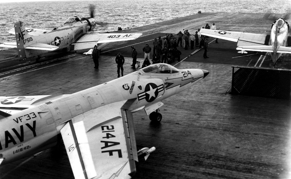 F11F-1 Tiger and AD-6 Skyraiders on USS Intrepid (CVA-11) on 18 November 1960 (NNAM.1996.253.7415.028)