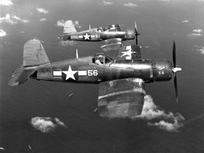 F4U-1 Corsairs of VMF-113 in flight near Eniwetok 1944