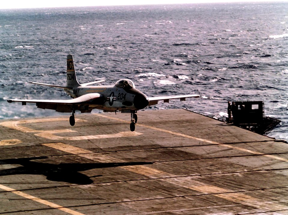 F2H-3 of VF-194 landing in USS Kearsarge (CVA-33) 1958