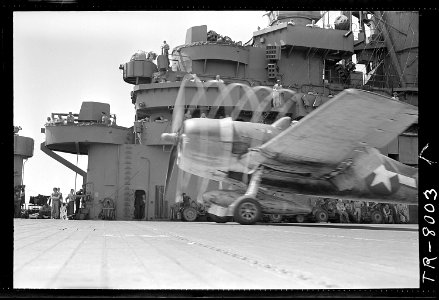 F6F goes down deck for take-off of USS Lexington (CV-16) - NARA - 520898