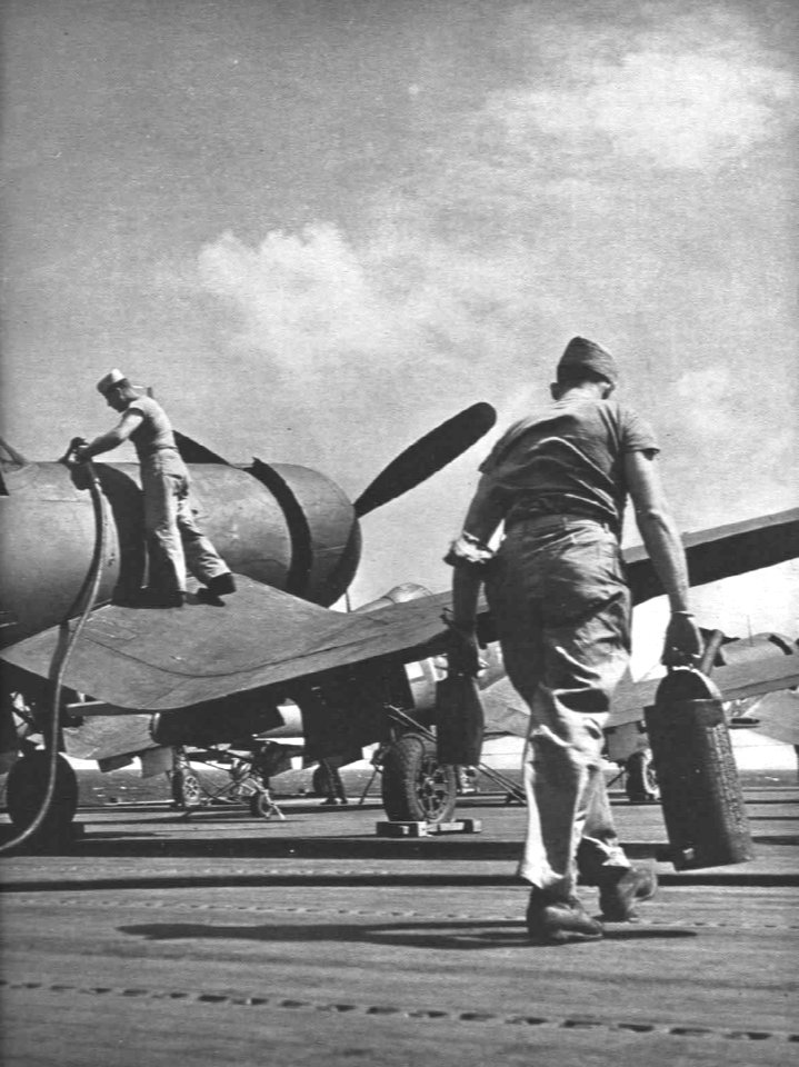 F4U-1 Corsairs are refueled aboard USS Franklin (CV-13) in early 1945