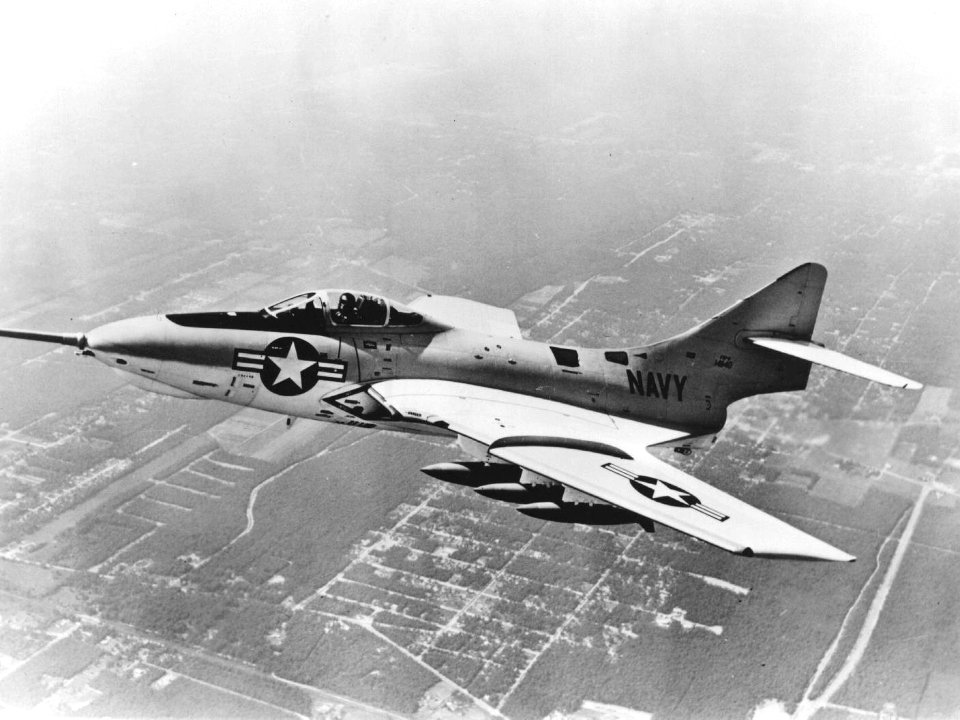 F8F-8 Cougar in flight with bombs in late 1950s