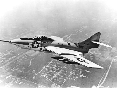 F8F-8 Cougar in flight with bombs in late 1950s