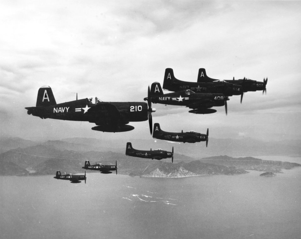 F4U Corsairs and AD Skyraiders of Air Group 101 in flight off Korea on 15 August 1951 (80-G-433006)