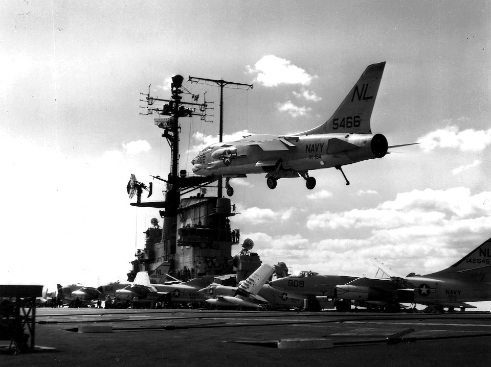 F8U-1E Crusader of VF-154 over USS Coral Sea (CVA-43) on 4 March 1961 (NNAM.1996.253.7350.008)
