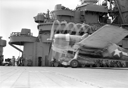 F6F goes down deck for take-off of USS Lexington (CV-16) - NARA - 520898