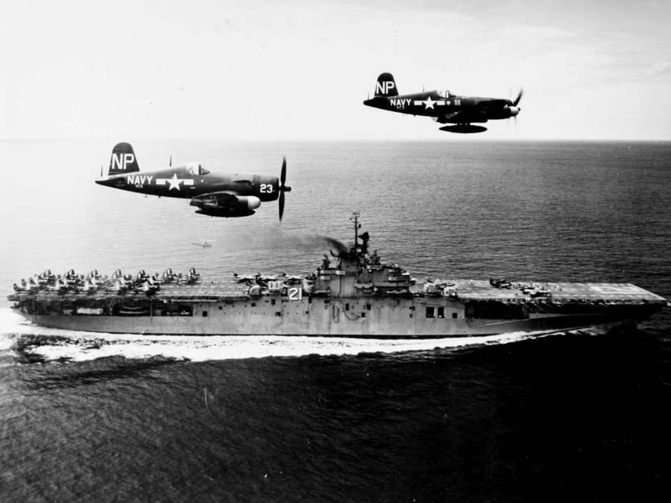 F4U-5N Corsairs of VC-3 fly past USS Boxer (CV-21) off Korea on 4 September 1951 (80-G-433005)