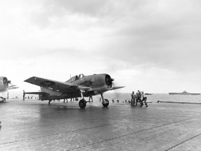 F6F-3 of VF-9 takes off from USS Essex (CV-9) off Truk in February 1944