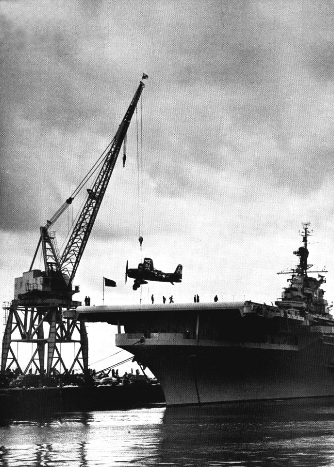 F8F is loaded on USS Boxer (CV-21) at NAS Alameda in 1950