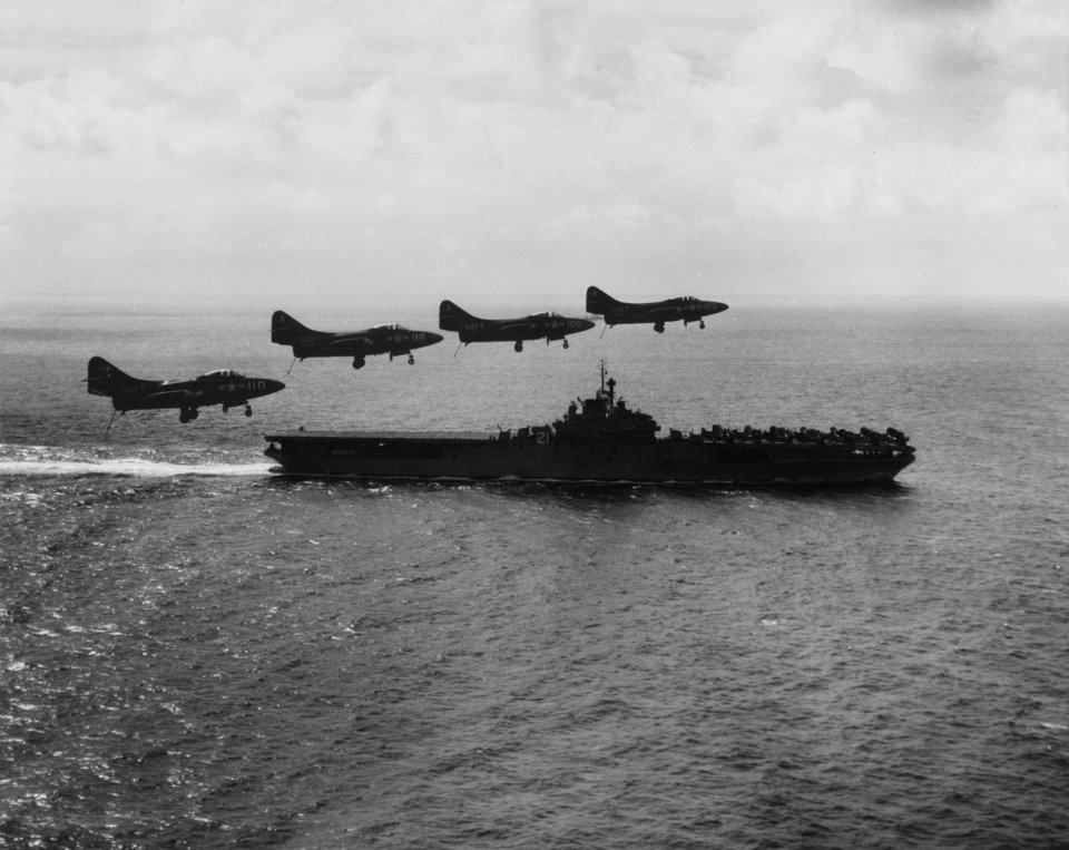F9F-2 Panthers of VF-721 return to USS Boxer (CV-21) off Korea on 23 June 1951 (NH 97281)
