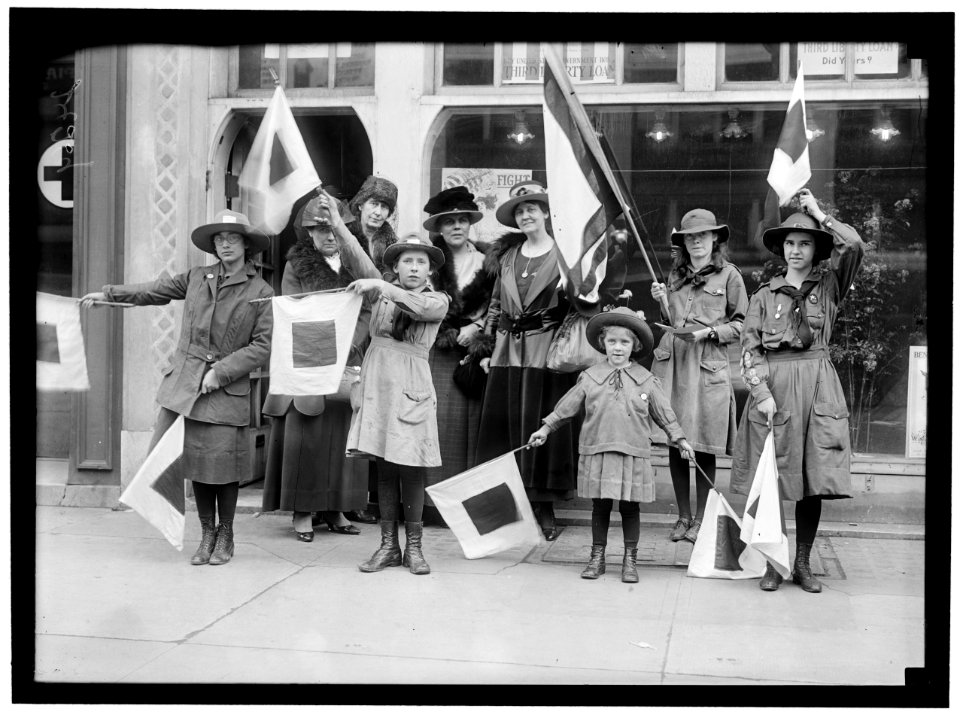 GIRL SCOUTS GROUP WITH LADIES. MRS. CHARLES S. HAMLIN, LEFT REAR, WITH DRAPED BLACK CROWN ON LIGHT BRIMMED HAT LCCN2016869088