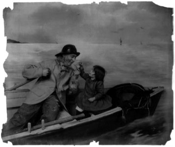Girl lighting pipe for old fisherman in boat LCCN2003675186