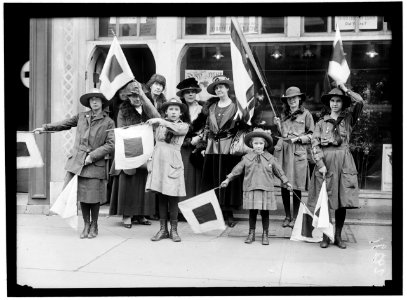 GIRL SCOUTS GROUP WITH LADIES. MRS. CHARLES S. HAMLIN, LEFT REAR, WITH DRAPED BLACK CROWN ON LIGHT BRIMMED HAT LCCN2016869090