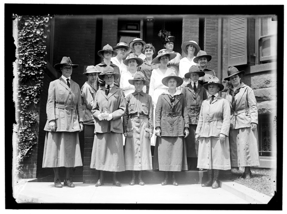 GIRL SCOUTS. NATIONAL AND LOCAL OFFICERS, LEFT, MRS. JAMES STORROW OF BOSTON; 2ND FROM LEFT FRONT, MRS. JULIETTE LOW, FOUNDER; 4TH FROM LEFT FRONT, VERA LAWRENCE, DIST. COMMANDR.; ABOVE LCCN2016869306