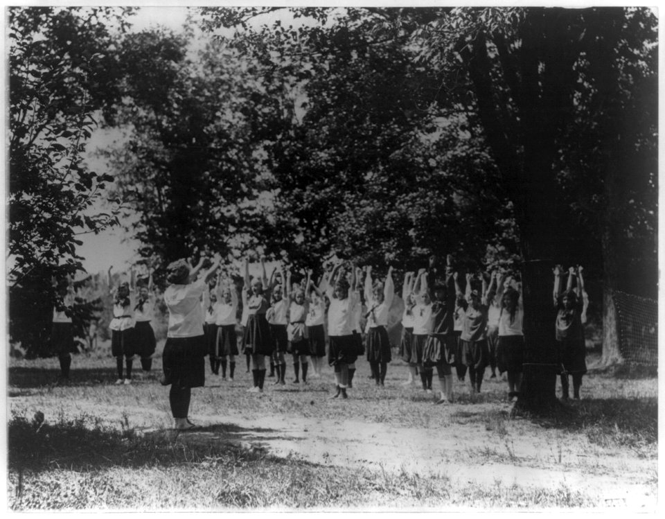 Girls from Washington, D.C., at Y.W.C.A. camp near Winona, Maryland, doing outdoor exercises LCCN2001706163