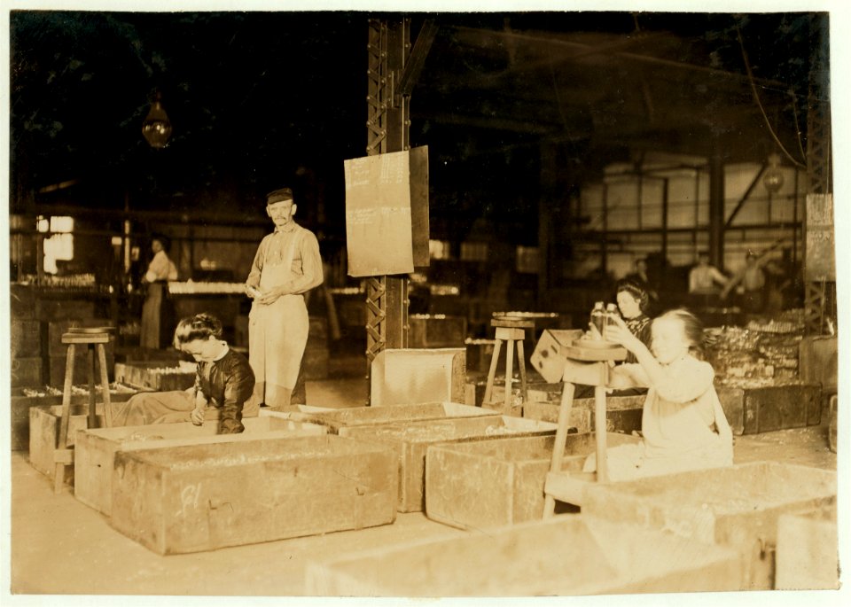 Girls in Packing Room. Central Glass Co., Wheeling West Virginia. Several very young girls pack here. LOC nclc.01192