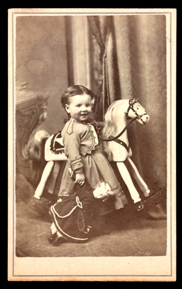 Girl with rocking horse and doll) - J. G. Stacy, Artist, cor. Main and Cherry Sts., Rahway, N.J LCCN2016653185