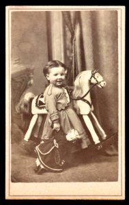 Girl with rocking horse and doll) - J. G. Stacy, Artist, cor. Main and Cherry Sts., Rahway, N.J LCCN2016653185