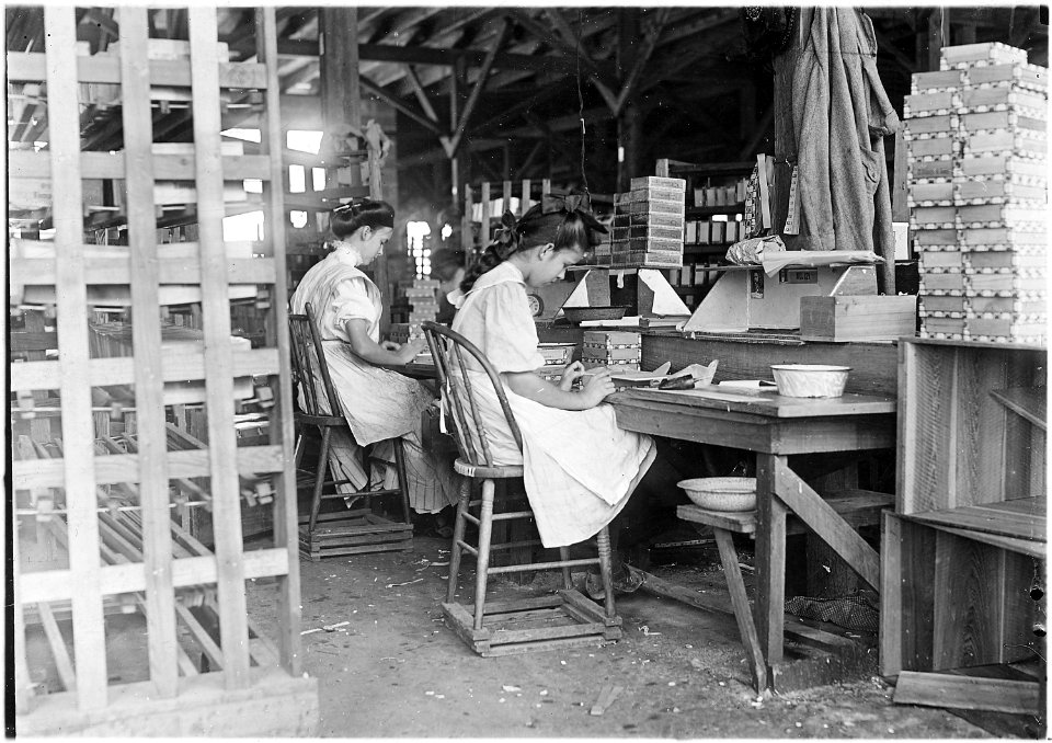 Girl working in Box Factory. I saw 10 small boys and girls working. Has a bad reputation for employment of... - NARA - 523166