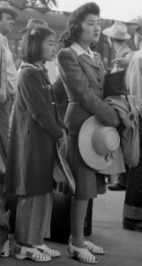 Girls detail, Woodland, California. Families of Japanese ancestry with their baggage at the railroad station wait . . . - NARA - 537805 (cropped)