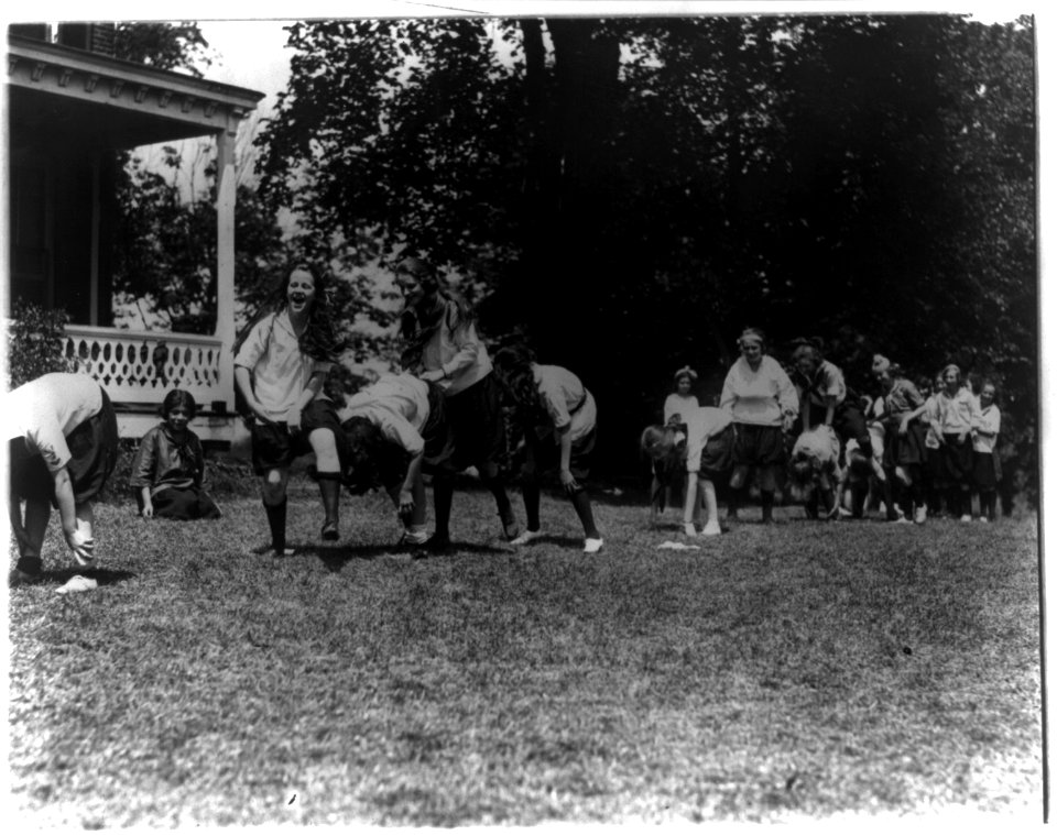 Girls from Washington, D.C., at Y.W.C.A. camp near Winona, Maryland, playing leapfrog LCCN2001706165