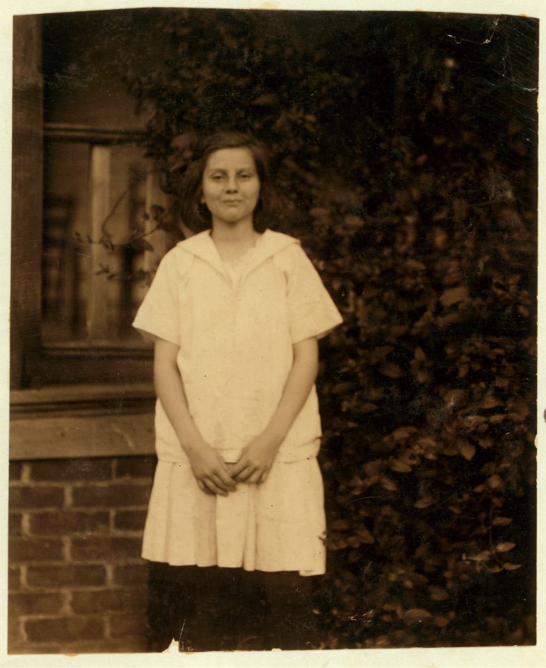Gladys Goodrum, 116 Short Street, Columbus, Ga. Said 12 years old. Seen working nearly one year as looper in Massey Hosiery Mill. Makes $9. a week sometimes. LOC nclc.02802
