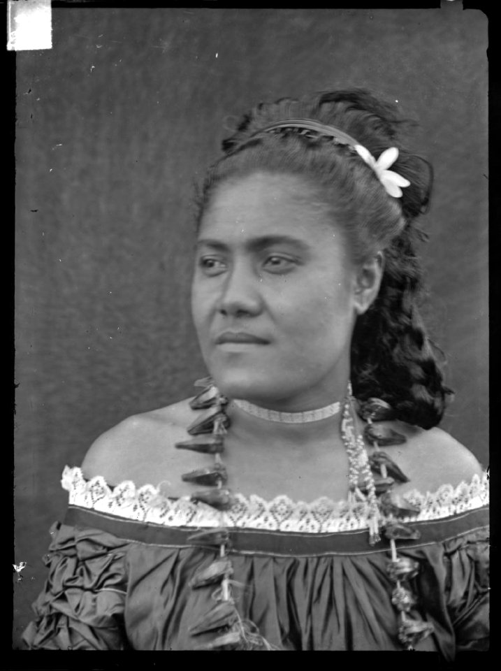 Glass negative (black and white); portrait of a woman in front of a neutral coloured backdrop; Tonga. Oc,G.N.1821, British Museum