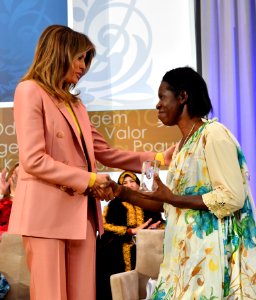 Godelieve Mukasarasi with Melania Trump at the 2018 International Women of Courage Award photo