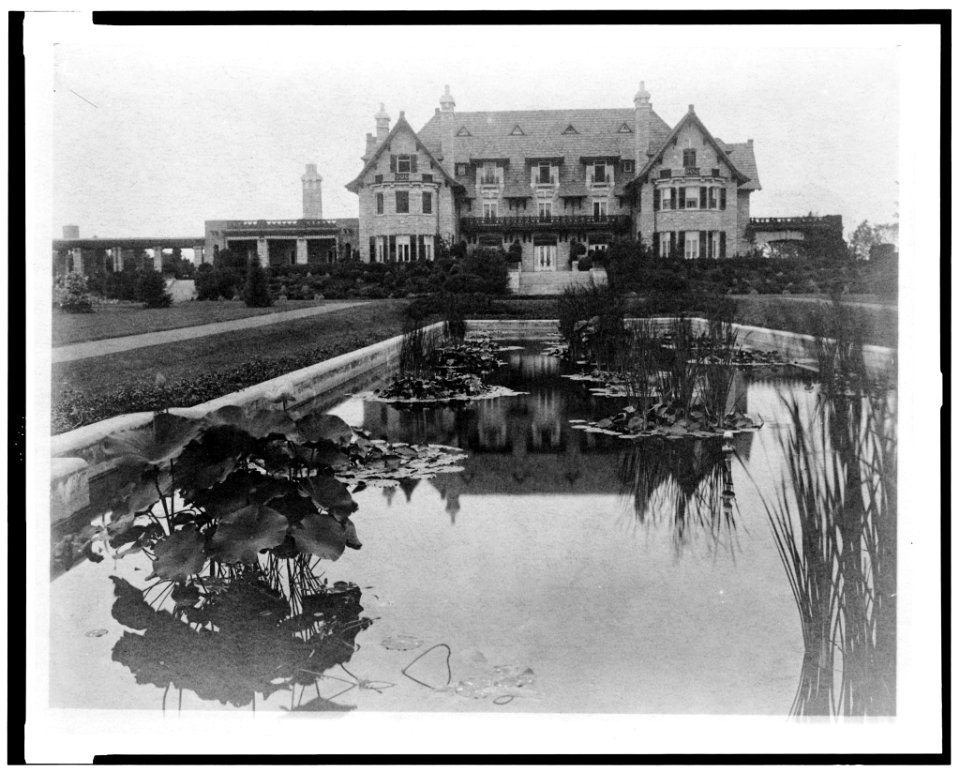 Facade of home of Edmund Cogswell Converse, with lily pond in foreground, Greenwich, Connecticut LCCN94502478
