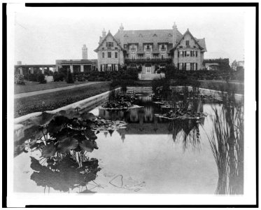 Facade of home of Edmund Cogswell Converse, with lily pond in foreground, Greenwich, Connecticut LCCN94502478