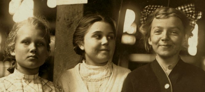 Face detail, A group of girl workers in Greenabaum's Canneries, Seaford, Del. These girls gave their ages as 10, 13 and 13. The 10 year old girl is working her first season while the two girls of 13 are LOC nclc.00801 (cropped)