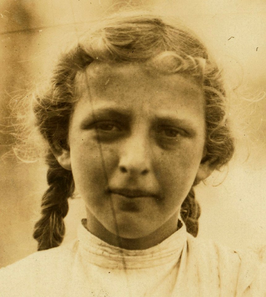 Face detail, 'Teeny' Adams, eleven years old. Picks shrimp at Biloxi Canning Co. Makes $1.15 on good days. Lost three weeks of school last month. Expects to work before school now, - I saw her beginning LOC cph.3a01044 (cropped)