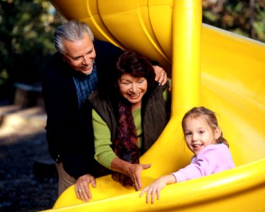 Family at a playground photo