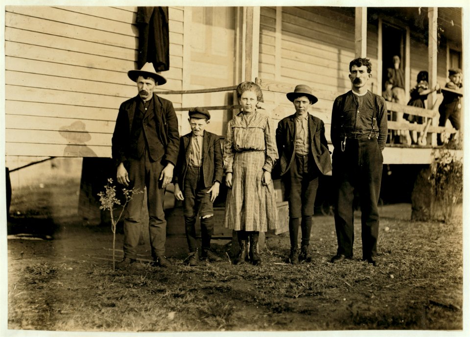 Family all in mill. Small boy been at it 4 years. Mother said 'she used to make her $1.00 a day spoolin' but she never can now at spinnin'. Some are better at one thing and some at another.' LOC nclc.01371