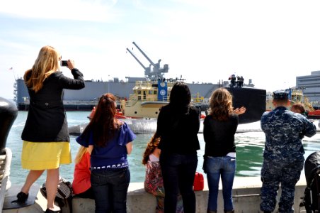 Family members watch USS Asheville depart. (8594720651)