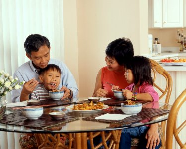 Family eating a meal photo