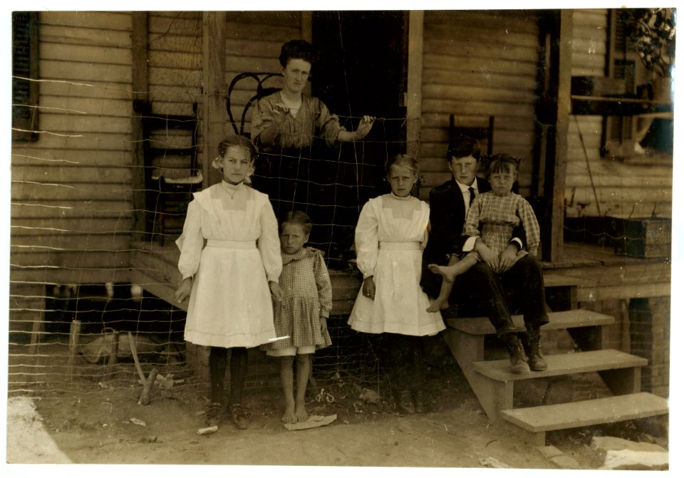 Family of A.P. Stata (he is at church). Father, son and two oldest girls in photo work in Washington Cotton Mills, Fries, Va. The little spinner on left of photo has been working three LOC nclc.02145
