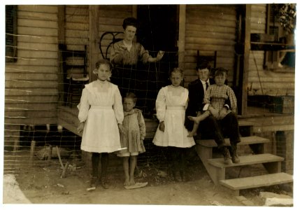 Family of A.P. Stata (he is at church). Father, son and two oldest girls in photo work in Washington Cotton Mills, Fries, Va. The little spinner on left of photo has been working three LOC nclc.02145