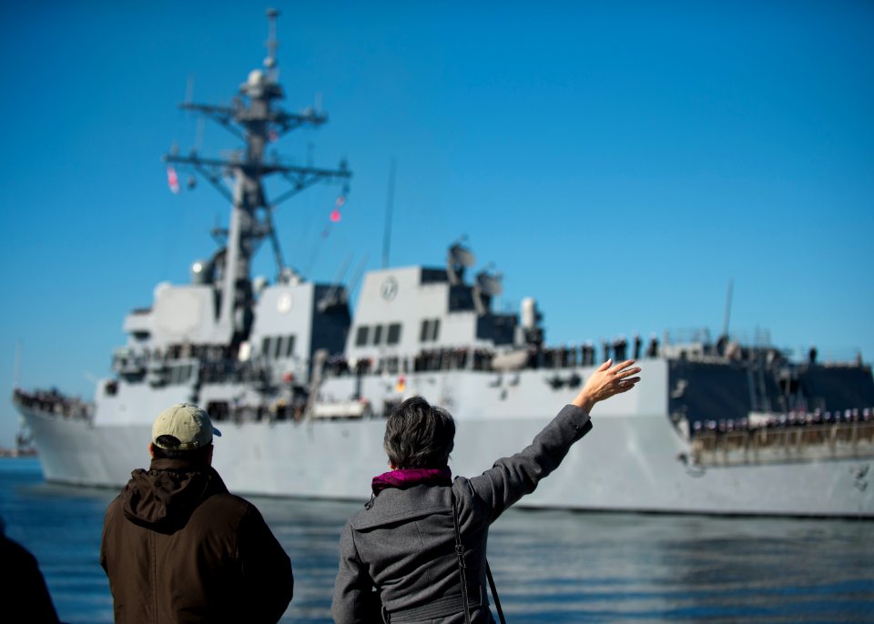 Family members wave to USS William P. Lawrence. (8387278460)