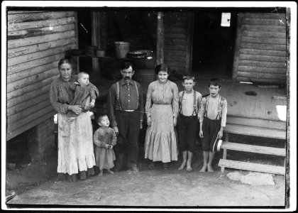 Family of L. W. Money. Father daughter and two boys work in spinning room of Washington Cotton Mills. Smallest worker... - NARA - 523431