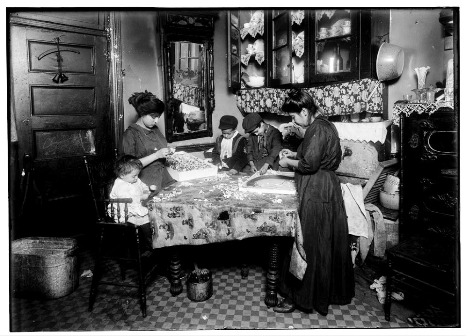 Family of Mrs. Mette making flowers in a very dirty tenement, 302 Mott St, top floor. Josephine, 13 yrs. old, helps out side school hours until 9 P.M. sometimes. She is soon to be 14 and LOC cph.3b45427