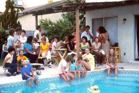 Family near a pool photo