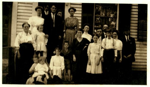Family of Adrienne Pagnette- The three standing in front row are Adrienne, Anna and Francis. Adrienne, an adolescent French Illiterate. Speaks almost no English. Is probably 14 or 15. Doffs LOC cph.3b12099