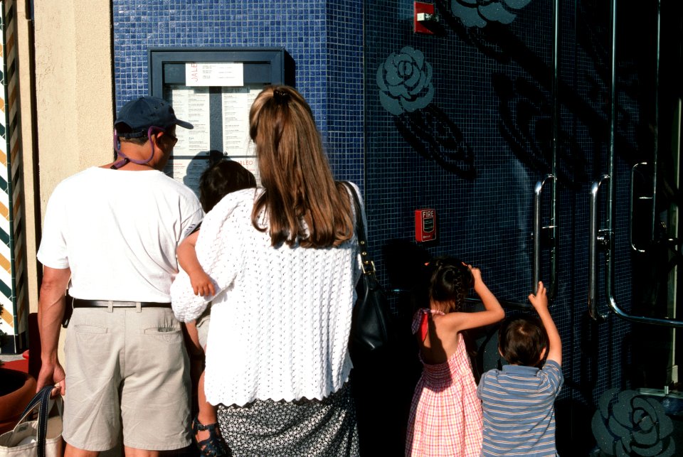 Family reviewing a menu