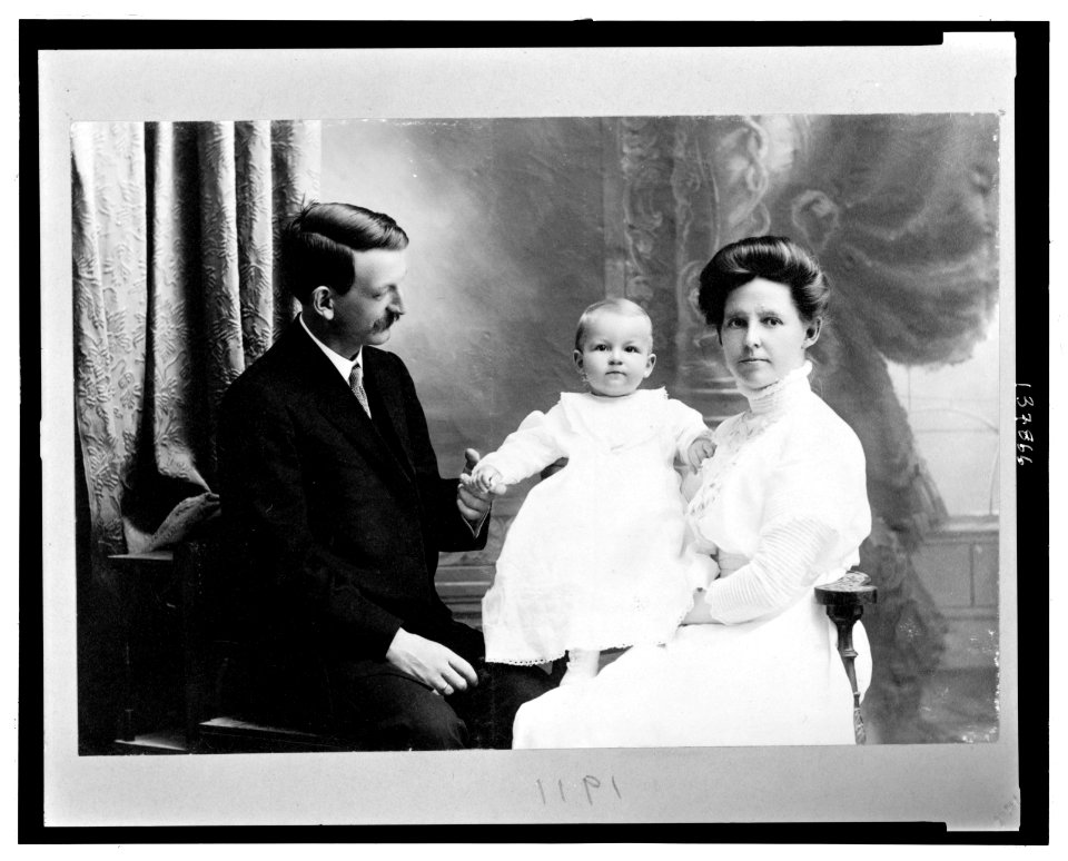 Family portrait of Grace Whiting holding son Spafford, with her husband John D. Whiting LCCN2008676306