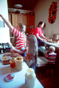 Family preparing a meal (1) photo