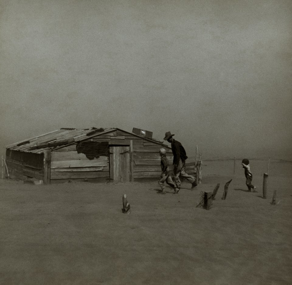 Farmer walking in dust storm Cimarron County Oklahoma1