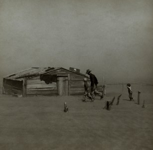 Farmer walking in dust storm Cimarron County Oklahoma1